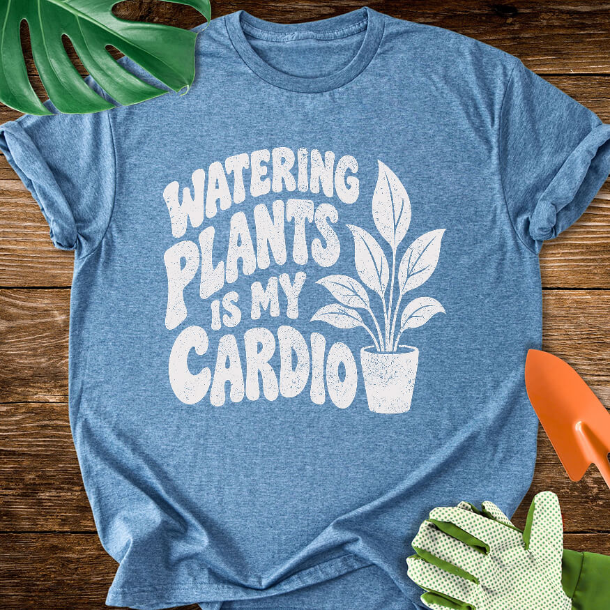 Heather indigo blue T-shirt with a potted plant beside bold "Watering Plants Is My Cardio" lettering.