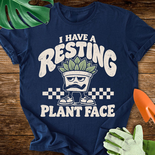 Navy blue T-shirt with a grumpy succulent in sneakers with "I Have a Resting Plant Face".