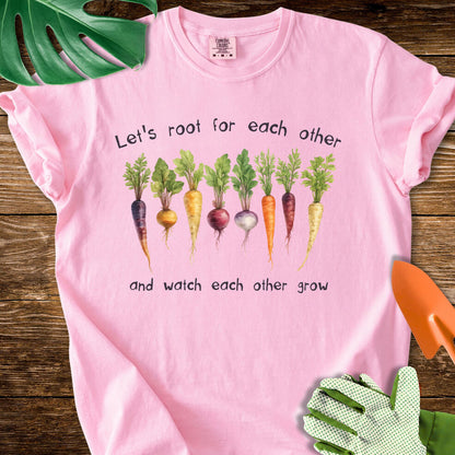 Blossom pink Comfort Colors T-shirt with root vegetables and "Let's Root for Each Other and Watch Each Other Grow".