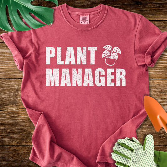 Crimson red Comfort Colors T-shirt with bold "Plant Manager" lettering with a potted plant icon.