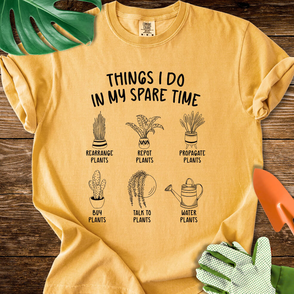 Mustard yellow Comfort Colors T-shirt with six illustrated plant hobbies under "Things I Do in My Spare Time".