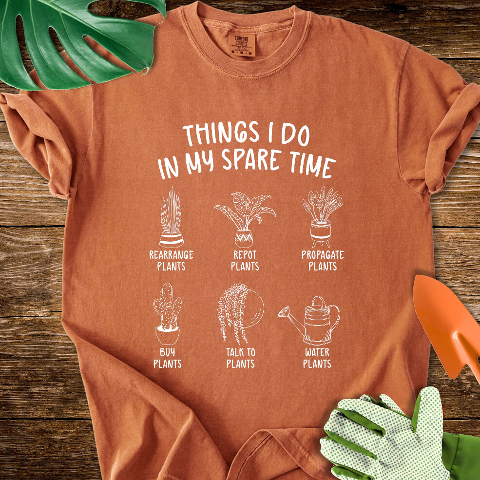 Burnt orange Comfort Colors T-shirt with six illustrated plant hobbies under "Things I Do in My Spare Time".