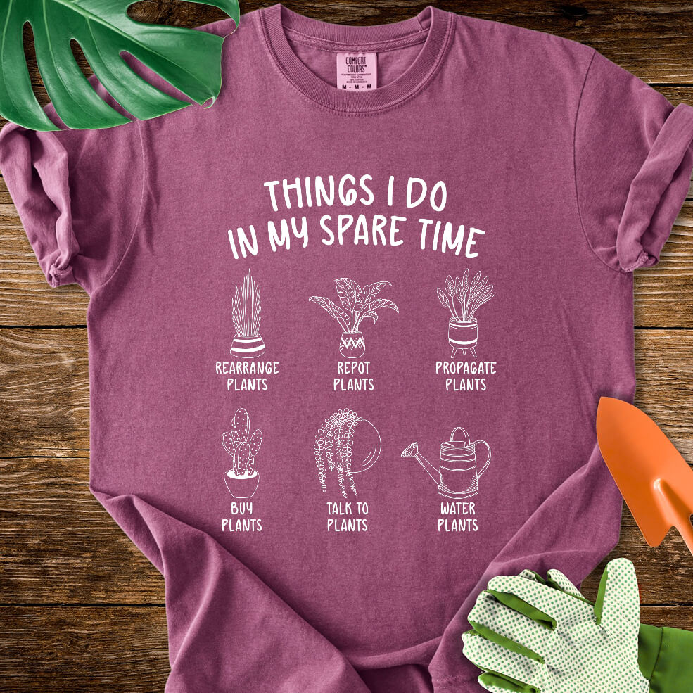 Berry purple Comfort Colors T-shirt with six illustrated plant hobbies under "Things I Do in My Spare Time".