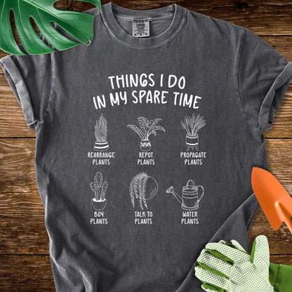 Pepper charcoal gray Comfort Colors T-shirt with six illustrated plant hobbies under "Things I Do in My Spare Time".