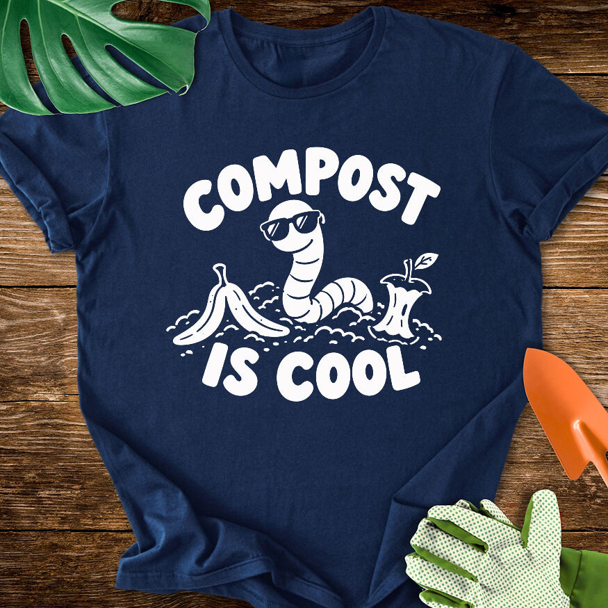 Navy blue T-shirt with a worm in sunglasses among scraps with "Compost Is Cool".