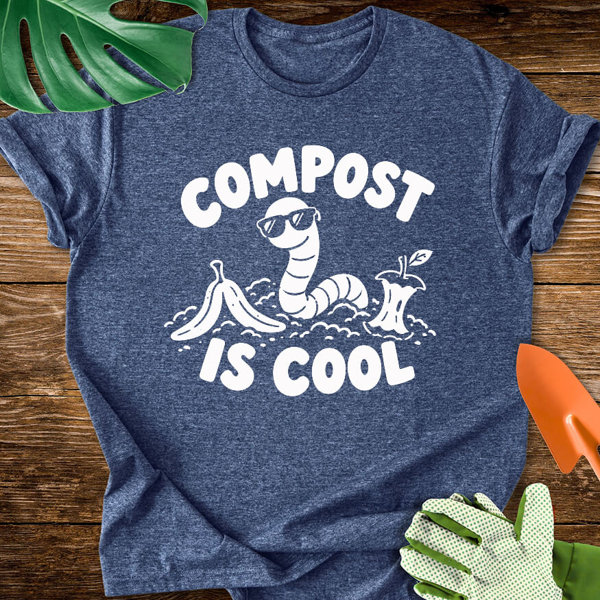 Heather navy blue T-shirt with a worm in sunglasses among scraps with "Compost Is Cool".