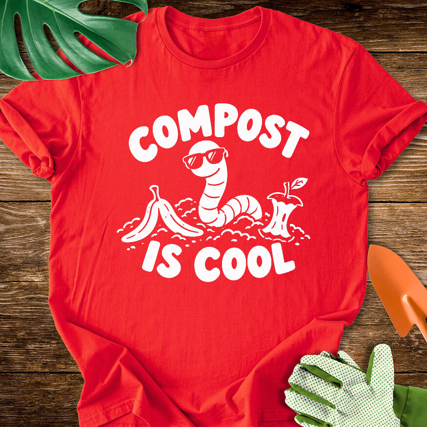 Red T-shirt with a worm in sunglasses among scraps with "Compost Is Cool".