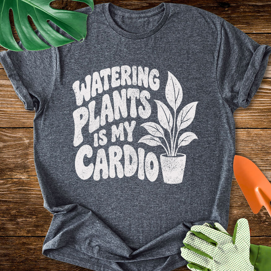 Dark heather gray T-shirt with a potted plant beside bold "Watering Plants Is My Cardio" lettering.