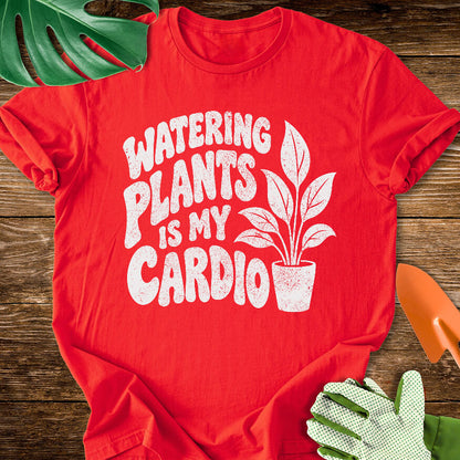 Red T-shirt with a potted plant beside bold "Watering Plants Is My Cardio" lettering.
