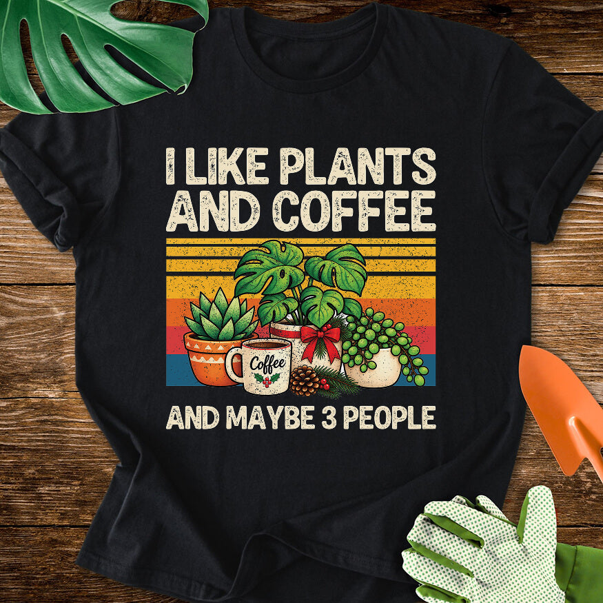 Black T-shirt with Christmas plants and coffee with "I Like Plants and Coffee and Maybe 3 People".