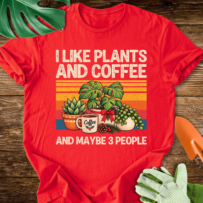 Red T-shirt with Christmas plants and coffee with "I Like Plants and Coffee and Maybe 3 People".