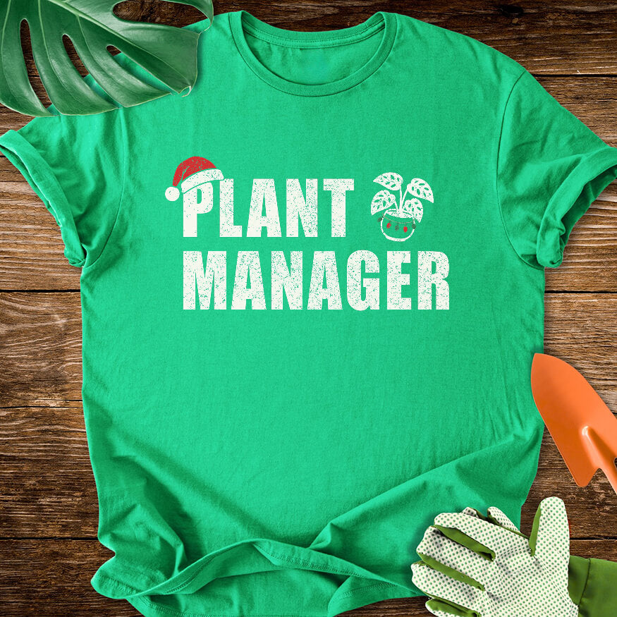 Irish green T-shirt with a Santa hat, festive plant pot, and "Plant Manager" lettering.