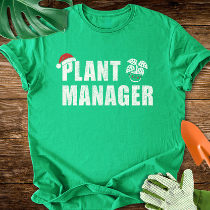 Irish green T-shirt with a Santa hat, festive plant pot, and "Plant Manager" lettering.