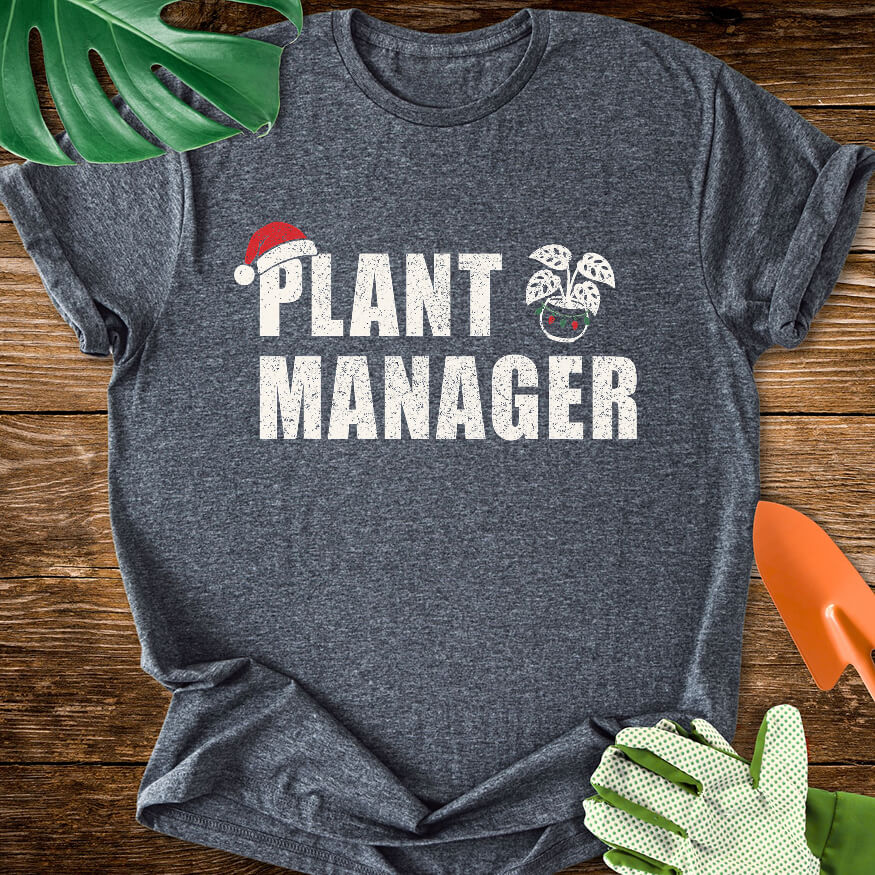 Dark heather gray T-shirt with a Santa hat, festive plant pot, and "Plant Manager" lettering.
