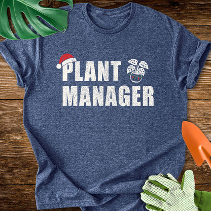 Heather navy blue T-shirt with a Santa hat, festive plant pot, and "Plant Manager" lettering.