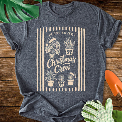 Dark heather gray T-shirt with festive houseplants in a striped "Plant Lovers Christmas Crew" design.