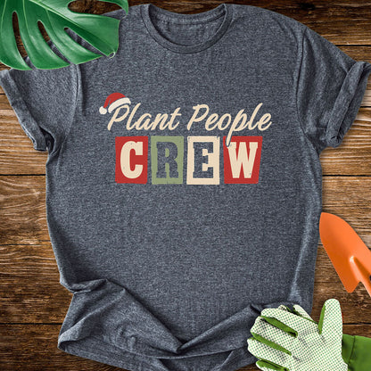 Dark heather gray T-shirt with a Santa hat above festive "Plant People Crew" lettering.
