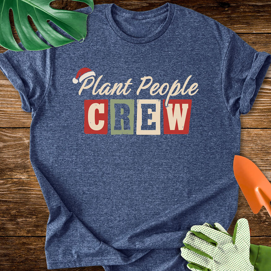 Heather navy blue T-shirt with a Santa hat above festive "Plant People Crew" lettering.