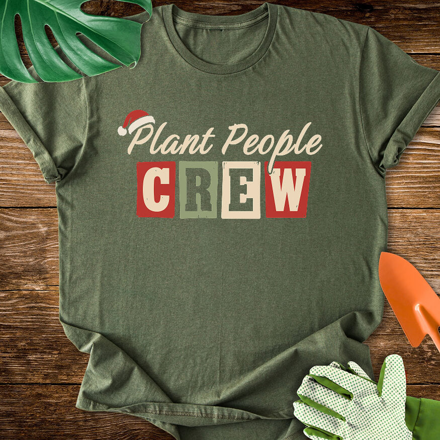 Military green T-shirt with a Santa hat above festive "Plant People Crew" lettering.