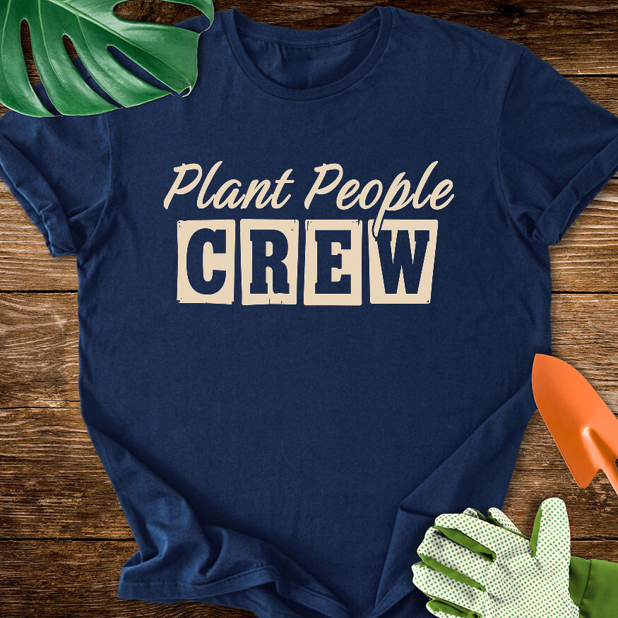Navy blue T-shirt with vintage-style lettering reading "Plant People Crew".