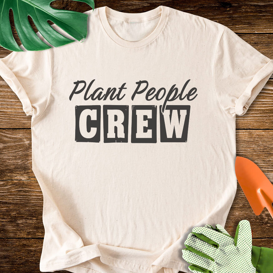 Natural cream T-shirt with vintage-style lettering reading "Plant People Crew".