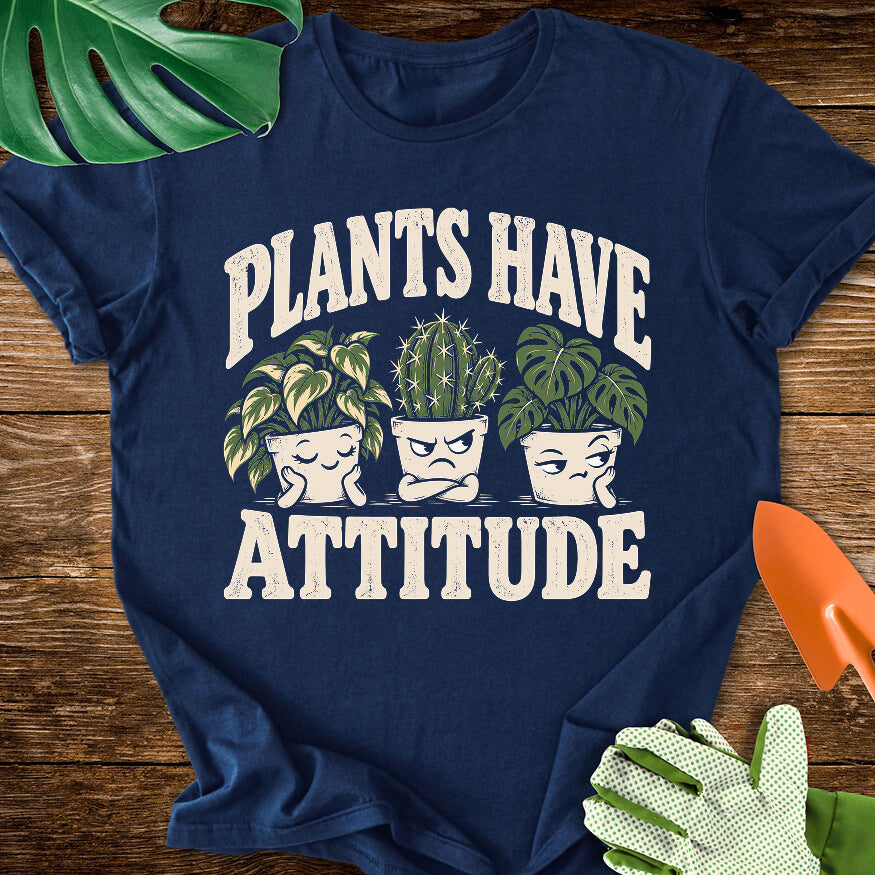 Navy blue T-shirt with three expressive potted houseplants with "Plants Have Attitude".