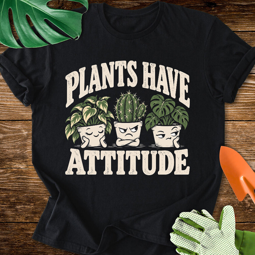 Black T-shirt with three expressive potted houseplants with "Plants Have Attitude".
