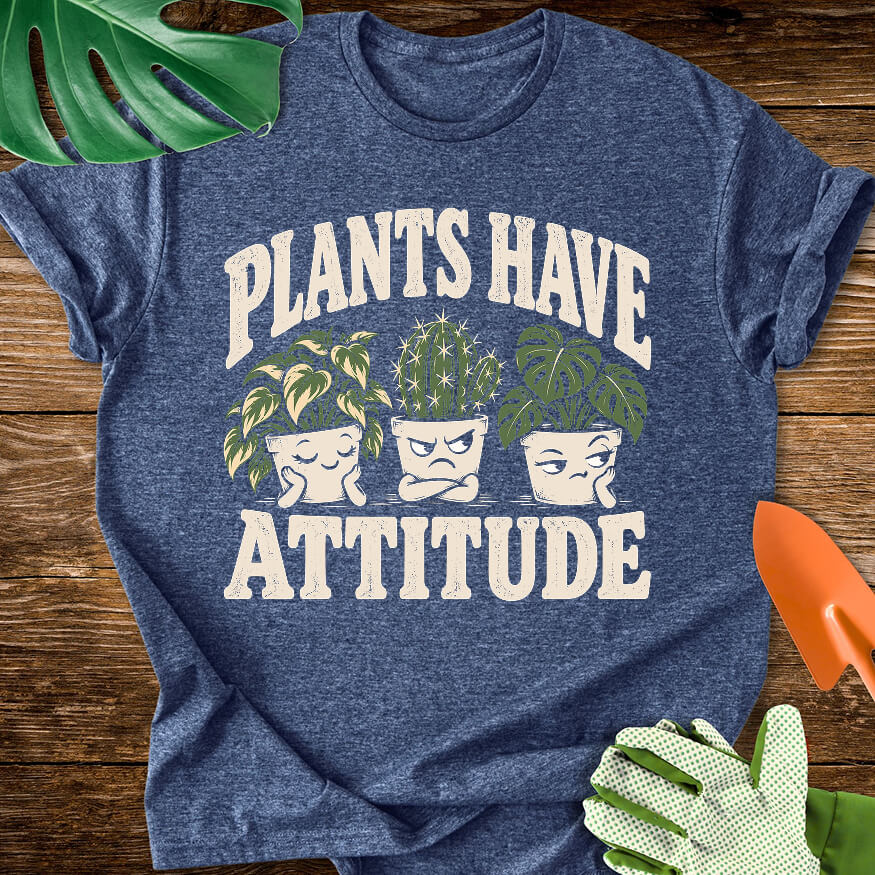 Heather navy blue T-shirt with three expressive potted houseplants with "Plants Have Attitude".