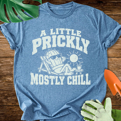 Heather indigo blue T-shirt with a cactus relaxing in sunglasses with "A Little Prickly, Mostly Chill".
