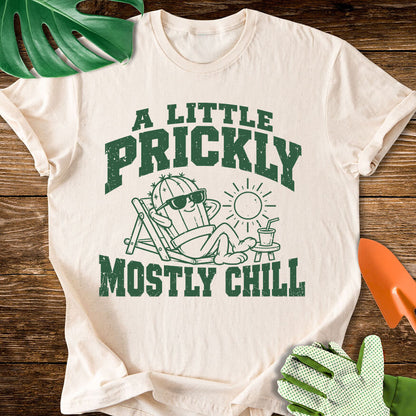 Natural cream T-shirt with a cactus relaxing in sunglasses with "A Little Prickly, Mostly Chill".