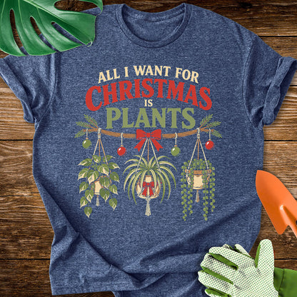 Heather navy blue T-shirt with festive hanging houseplants beneath "All I Want for Christmas Is Plants".