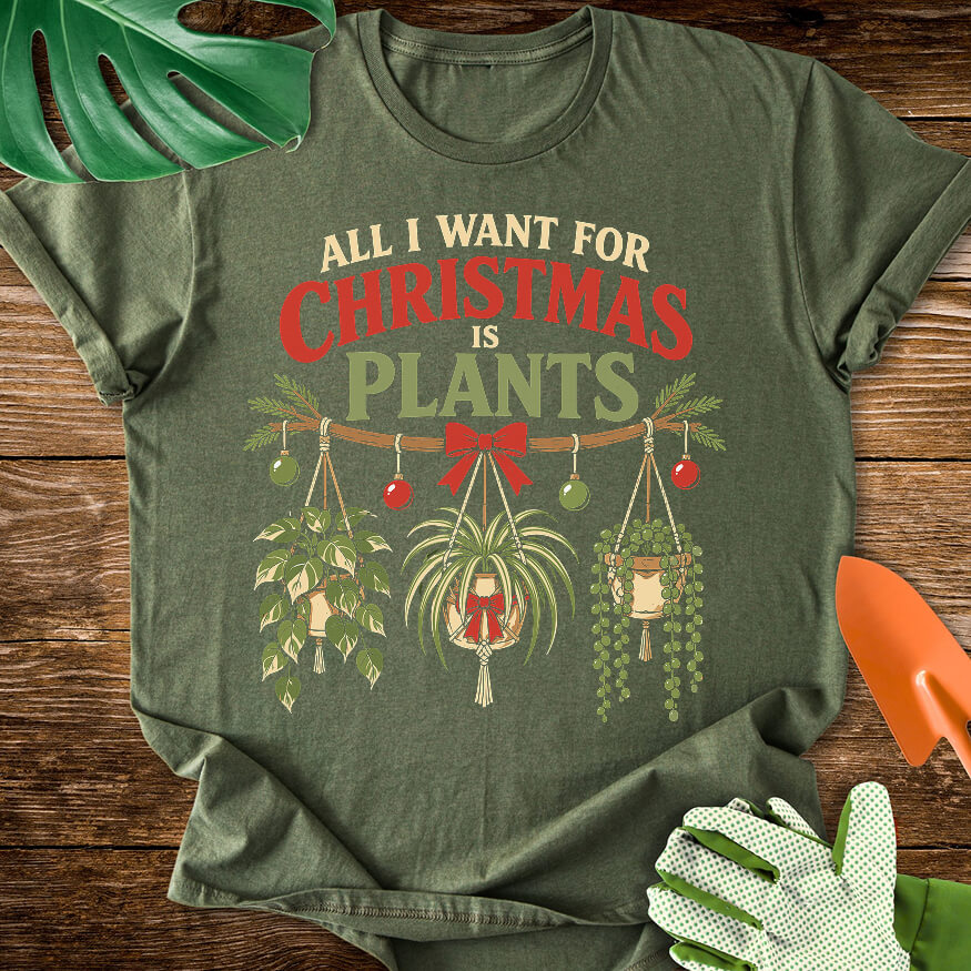Military green T-shirt with festive hanging houseplants beneath "All I Want for Christmas Is Plants".