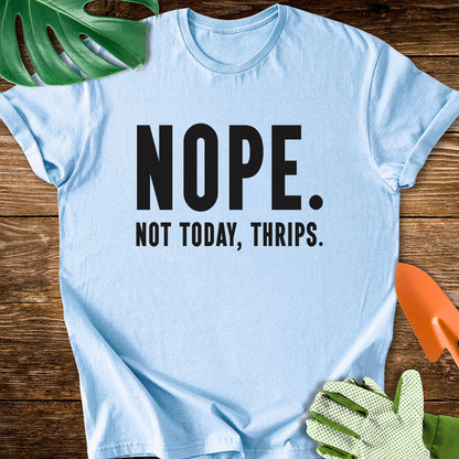 Light blue T-shirt with bold lettering reading "Nope. Not Today, Thrips.".