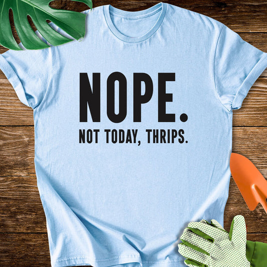 Light blue T-shirt with bold lettering reading "Nope. Not Today, Thrips.".
