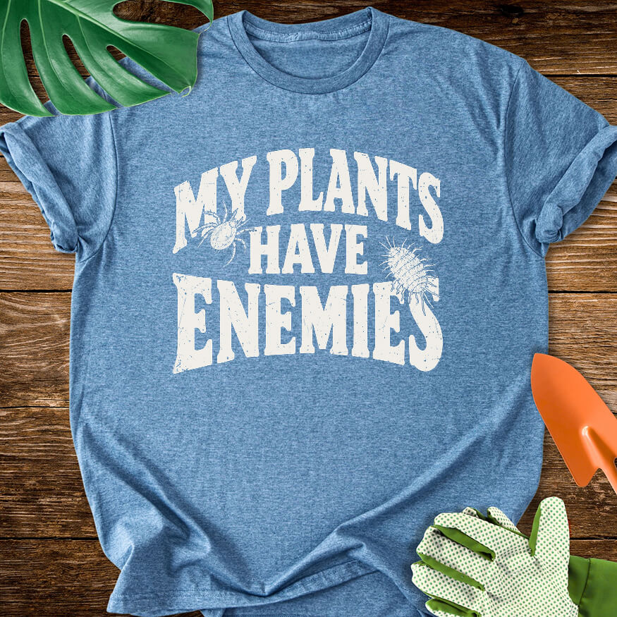 Heather indigo blue T-shirt with plant pest illustrations around "My Plants Have Enemies" lettering.