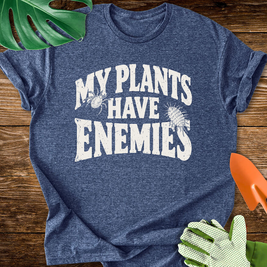 Heather navy blue T-shirt with plant pest illustrations around "My Plants Have Enemies" lettering.