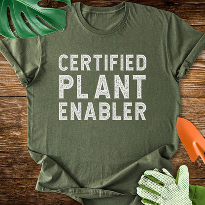 Military green T-shirt with bold distressed lettering reading "Certified Plant Enabler".